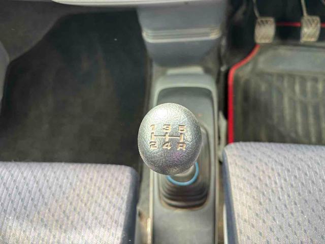 ワゴンＲ ＦＸ　キーレスエントリー　電動格納ミラー　ＭＴ　盗難防止システム　ＡＢＳ　ＣＤ　衝突安全ボディ　エアコン　パワーステアリング　パワーウィンドウ（11枚目）