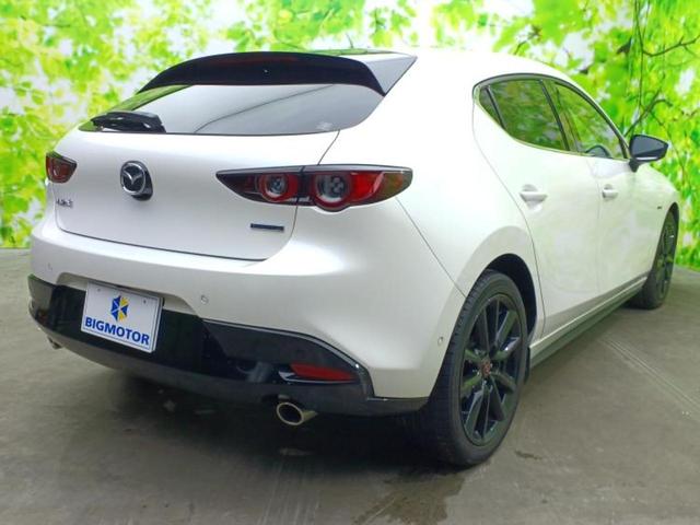 ＭＡＺＤＡ３ファストバック １５Ｓ１００シュウネントクベツキネンシャ　ＢＯＳＥ／保証書／純正　ＨＤＤナビ／衝突安全装置／シートヒーター／全方位モニター／車線逸脱防止支援システム／シート　フルレザー／パーキングアシスト　バックガイド／ヘッドランプ　ＬＥＤ　革シート　ＥＴＣ（3枚目）