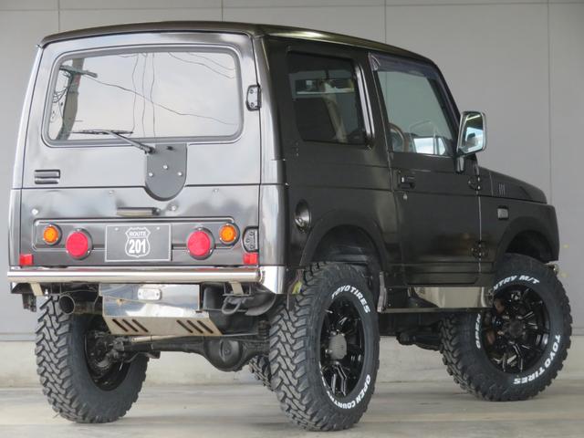 ジムニー ワイルドウインド　ガンＭ全塗装　リフトアップ　新品ＢＡＤＸ　ＤＯＳ＋オープンカントリー２２５／７５／１６　オーバーフェンダー／グリル各部チッピング黒塗装　社外前後バンパー／マフラー／テール／ＬＥＤフォグ／シートカバー（2枚目）