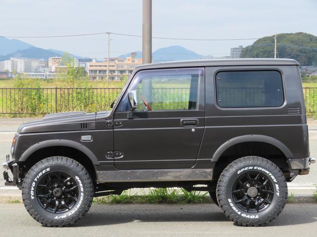 ジムニー ワイルドウインド　ガンＭ全塗装　リフトアップ　新品ＢＡＤＸ　ＤＯＳ＋オープンカントリー２２５／７５／１６　オーバーフェンダー／グリル各部チッピング黒塗装　社外前後バンパー／マフラー／テール／ＬＥＤフォグ／シートカバー（12枚目）