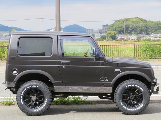 ジムニー ワイルドウインド　ガンＭ全塗装　リフトアップ　新品ＢＡＤＸ　ＤＯＳ＋オープンカントリー２２５／７５／１６　オーバーフェンダー／グリル各部チッピング黒塗装　社外前後バンパー／マフラー／テール／ＬＥＤフォグ／シートカバー（13枚目）