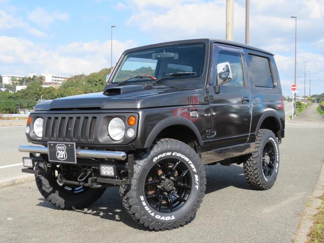 ジムニー ワイルドウインド　ガンＭ全塗装　リフトアップ　新品ＢＡＤＸ　ＤＯＳ＋オープンカントリー２２５／７５／１６　オーバーフェンダー／グリル各部チッピング黒塗装　社外前後バンパー／マフラー／テール／ＬＥＤフォグ／シートカバー（14枚目）