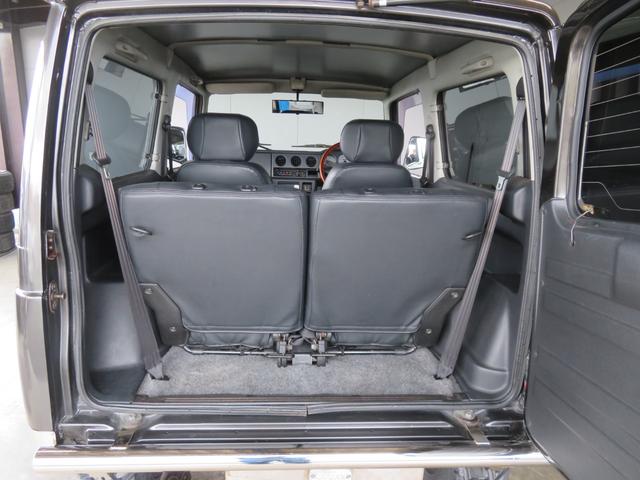 ジムニー ワイルドウインド　ガンＭ全塗装　リフトアップ　新品ＢＡＤＸ　ＤＯＳ＋オープンカントリー２２５／７５／１６　オーバーフェンダー／グリル各部チッピング黒塗装　社外前後バンパー／マフラー／テール／ＬＥＤフォグ／シートカバー（20枚目）