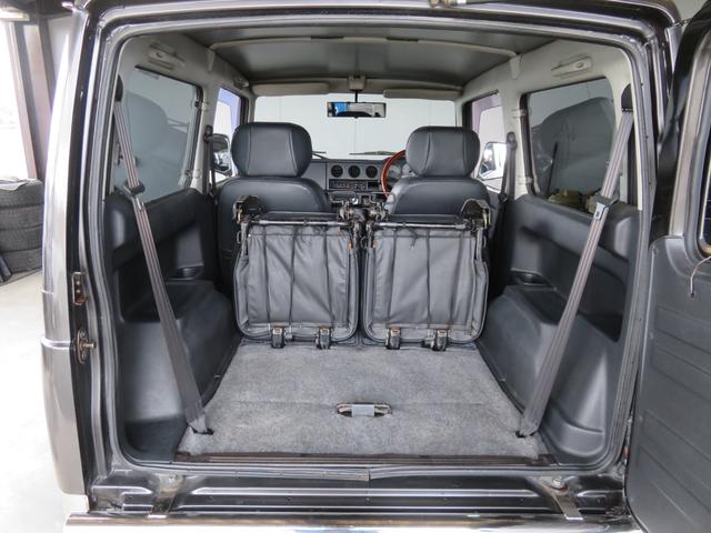 ジムニー ワイルドウインド　ガンＭ全塗装　リフトアップ　新品ＢＡＤＸ　ＤＯＳ＋オープンカントリー２２５／７５／１６　オーバーフェンダー／グリル各部チッピング黒塗装　社外前後バンパー／マフラー／テール／ＬＥＤフォグ／シートカバー（21枚目）