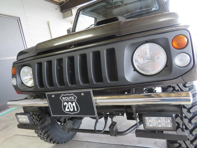 ジムニー ワイルドウインド　ガンＭ全塗装　リフトアップ　新品ＢＡＤＸ　ＤＯＳ＋オープンカントリー２２５／７５／１６　オーバーフェンダー／グリル各部チッピング黒塗装　社外前後バンパー／マフラー／テール／ＬＥＤフォグ／シートカバー（52枚目）