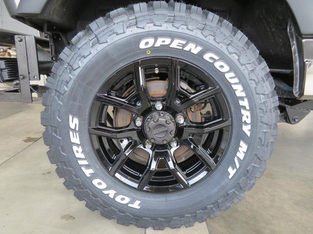 ジムニー ワイルドウインド　ガンＭ全塗装　リフトアップ　新品ＢＡＤＸ　ＤＯＳ＋オープンカントリー２２５／７５／１６　オーバーフェンダー／グリル各部チッピング黒塗装　社外前後バンパー／マフラー／テール／ＬＥＤフォグ／シートカバー（75枚目）