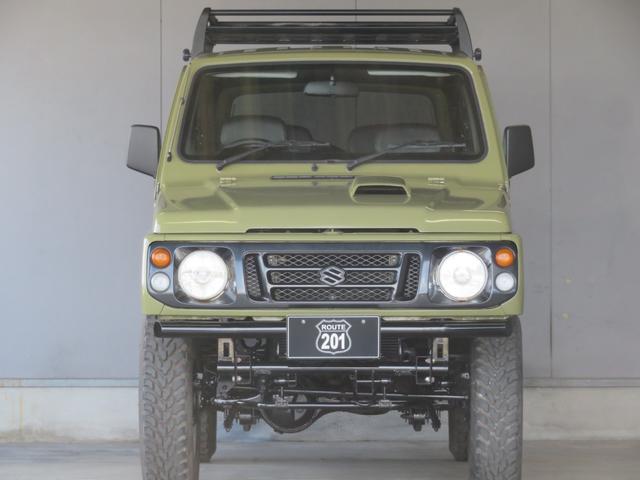 ジムニー ランドベンチャー　ＪＥＥＰ純正コマンドグリーン全塗装　内装塗装　下回り／ホイールブラック塗装　最終型　２インチボディリフトＵＰ　縞板調天張り　カーボン調ハンドル　社外マフラー／前後バンパー／シフトノブ／革調シートカバー（10枚目）