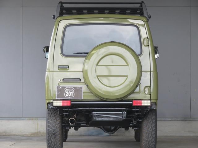 ジムニー ランドベンチャー　ＪＥＥＰ純正コマンドグリーン全塗装　内装塗装　下回り／ホイールブラック塗装　最終型　２インチボディリフトＵＰ　縞板調天張り　カーボン調ハンドル　社外マフラー／前後バンパー／シフトノブ／革調シートカバー（11枚目）