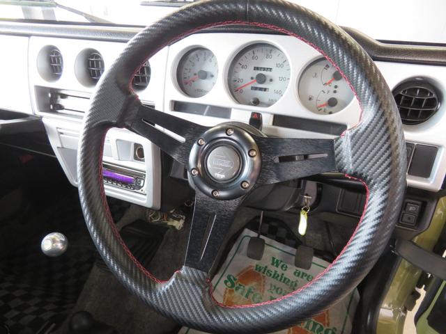 ジムニー ランドベンチャー　ＪＥＥＰ純正コマンドグリーン全塗装　内装塗装　下回り／ホイールブラック塗装　最終型　２インチボディリフトＵＰ　縞板調天張り　カーボン調ハンドル　社外マフラー／前後バンパー／シフトノブ／革調シートカバー（32枚目）