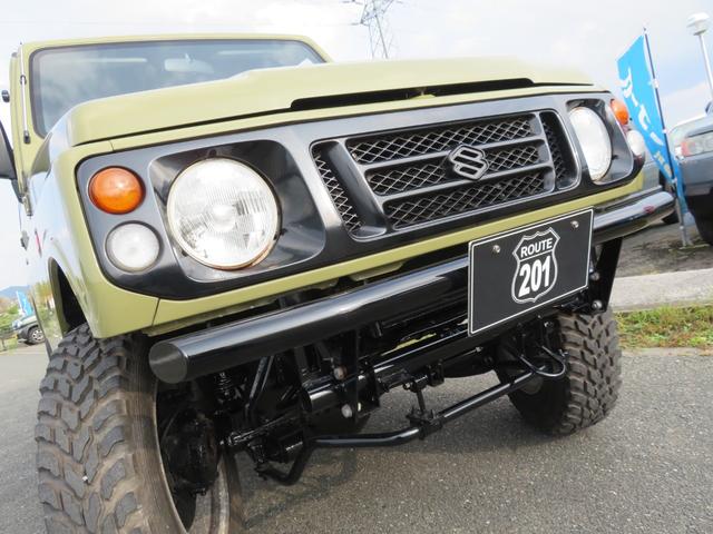 ジムニー ランドベンチャー　ＪＥＥＰ純正コマンドグリーン全塗装　内装塗装　下回り／ホイールブラック塗装　最終型　２インチボディリフトＵＰ　縞板調天張り　カーボン調ハンドル　社外マフラー／前後バンパー／シフトノブ／革調シートカバー（46枚目）