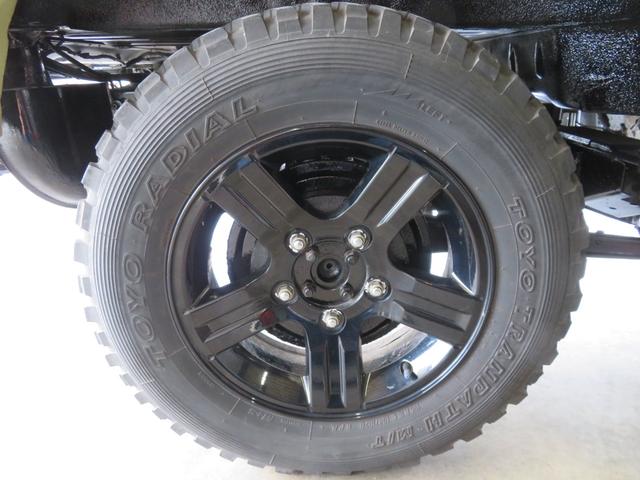 ジムニー ランドベンチャー　ＪＥＥＰ純正コマンドグリーン全塗装　内装塗装　下回り／ホイールブラック塗装　最終型　２インチボディリフトＵＰ　縞板調天張り　カーボン調ハンドル　社外マフラー／前後バンパー／シフトノブ／革調シートカバー（76枚目）