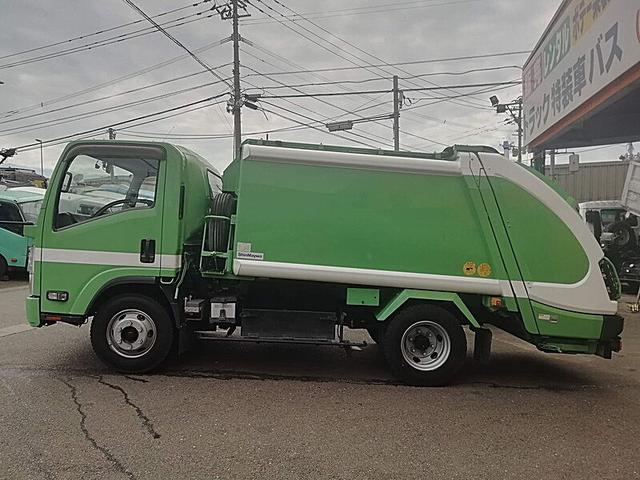 エルフトラック 3t プレス式 6.0立米 パッカー車 GPX 内容量/6.0m3 作動方式/プレス 連続スイッチあり 荷箱前物入れあり 工具箱/1個(8枚目)