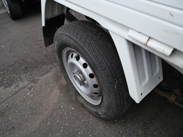 ミニキャブトラック Ｖタイプ　セレクト４ＷＤ車　エアコン　パワーステアリング　三方開　荷台ガード　ラジオ　ライトレベル調節（12枚目）