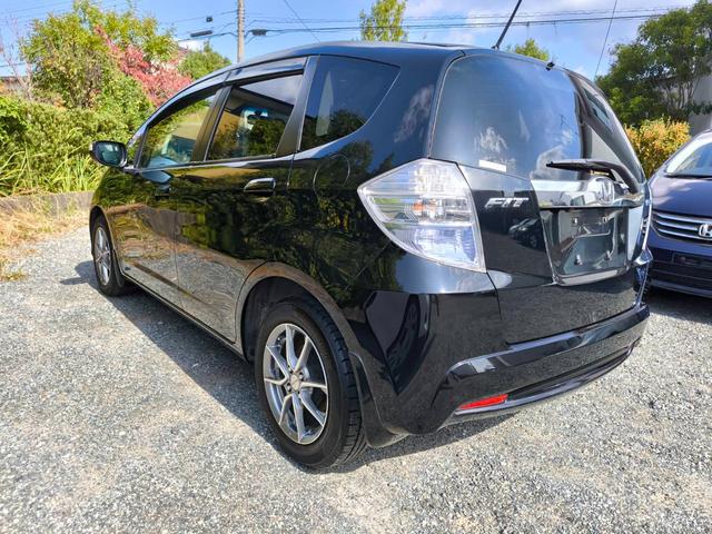 フィットハイブリッド スマートセレクション　禁煙車・スマートキー・フルセグナビ・Ｂｌｕｅｔｏｏｔｈオーディオ・ＥＴＣ・ＨＩＤヘッドライト・社外アルミホイール・オートクルーズ（8枚目）