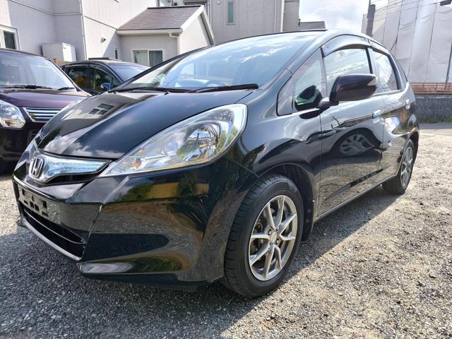 フィットハイブリッド スマートセレクション　禁煙車・スマートキー・フルセグナビ・Ｂｌｕｅｔｏｏｔｈオーディオ・ＥＴＣ・ＨＩＤヘッドライト・社外アルミホイール・オートクルーズ（11枚目）