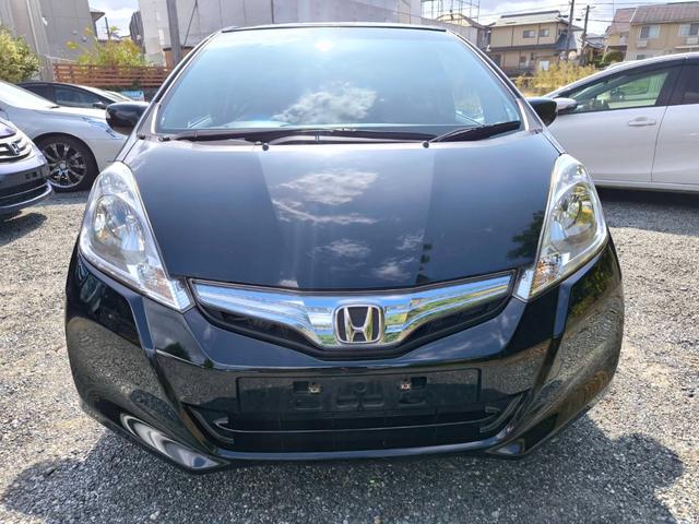 フィットハイブリッド スマートセレクション　禁煙車・スマートキー・フルセグナビ・Ｂｌｕｅｔｏｏｔｈオーディオ・ＥＴＣ・ＨＩＤヘッドライト・社外アルミホイール・オートクルーズ（12枚目）