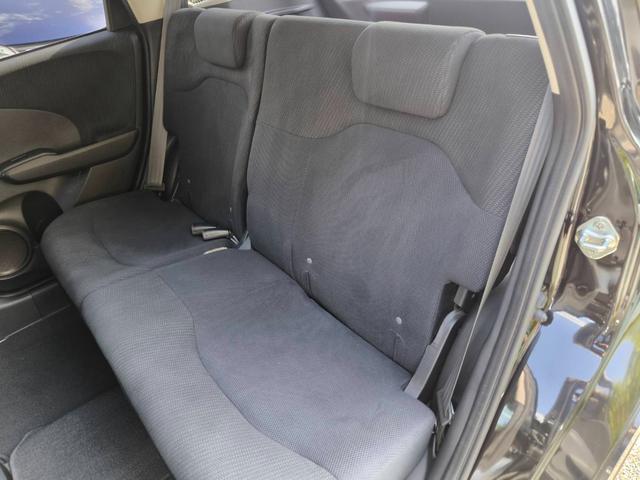 フィットハイブリッド スマートセレクション　禁煙車・スマートキー・フルセグナビ・Ｂｌｕｅｔｏｏｔｈオーディオ・ＥＴＣ・ＨＩＤヘッドライト・社外アルミホイール・オートクルーズ（21枚目）