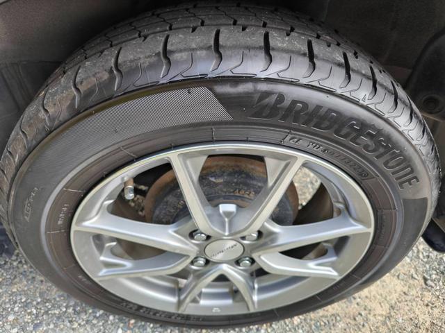 フィットハイブリッド スマートセレクション　禁煙車・スマートキー・フルセグナビ・Ｂｌｕｅｔｏｏｔｈオーディオ・ＥＴＣ・ＨＩＤヘッドライト・社外アルミホイール・オートクルーズ（56枚目）