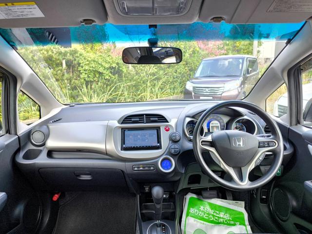 フィットハイブリッド スマートセレクション　禁煙車・スマートキー・フルセグナビ・Ｂｌｕｅｔｏｏｔｈオーディオ・ＥＴＣ・ＨＩＤヘッドライト・社外アルミホイール・オートクルーズ（58枚目）