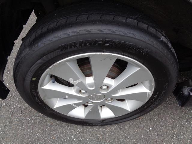 ワゴンＲ ＦＸリミテッド　プッシュスタート　スマートキー　Ｈライト研磨コーティング済　１４インチアルミホイール　エアロ　ベンチシート　ドリンクホルダー（42枚目）
