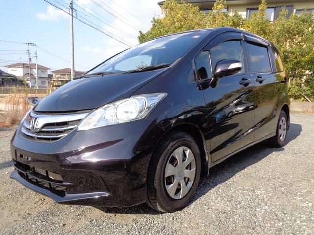 フリード 　ＧＨ　ワンオーナー　禁煙車　ワンセグナビ　バックカメラ　左側自動スライドドア　ＥＴＣ　ＨＩＤ　６人乗り　オートエアコン　オートライト　スマートキー　ＣＤ／ＤＶＤ（5枚目）