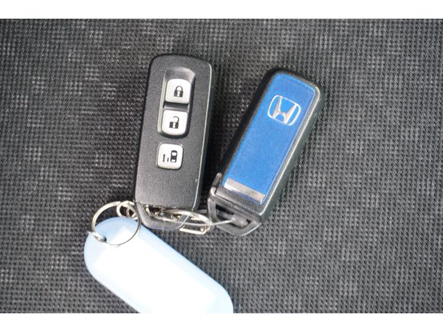 Ｎ－ＢＯＸカスタム Ｇ・Ｌパッケージ　ツートンカラー　ルーフシルバー　グリルブラック　ワンセグナビ　バックカメラ　ＥＴＣ　スマートキー２個　リア席サンシェード　ＨＩＤ　ＬＥＤルームランプ　１４インチアルミホイール（35枚目）