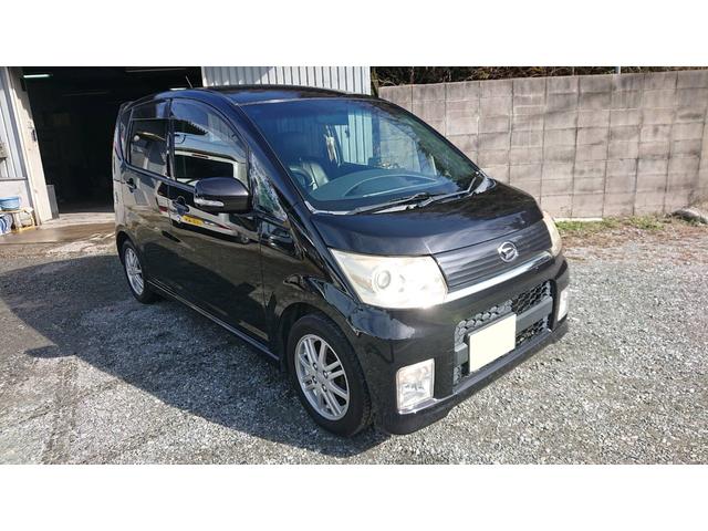 ムーヴ カスタム　Ｘ　ｍｏｍｏステアリング　スマートキー　キーレスエントリー　盗難防止システム　衝突安全ボディ　パワーステアリング（4枚目）