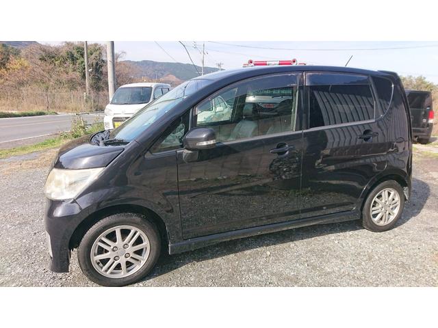 ムーヴ カスタム　Ｘ　ｍｏｍｏステアリング　スマートキー　キーレスエントリー　盗難防止システム　衝突安全ボディ　パワーステアリング（6枚目）