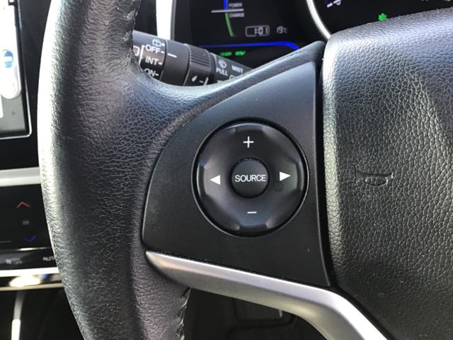 フィットハイブリッド Fパッケージ ハイブリッド ETC バックカメラ ナビ TV オートクルーズコントロール オートライト スマートキー アイドリングストップ 電動格納ミラー AT 盗難防止システム 衝突安全ボディ CD DVD再生(10枚目)