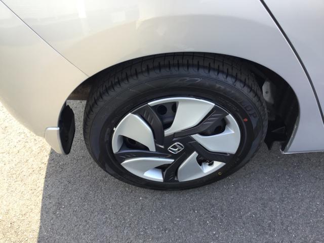 フィットハイブリッド Fパッケージ ハイブリッド ETC バックカメラ ナビ TV オートクルーズコントロール オートライト スマートキー アイドリングストップ 電動格納ミラー AT 盗難防止システム 衝突安全ボディ CD DVD再生(27枚目)