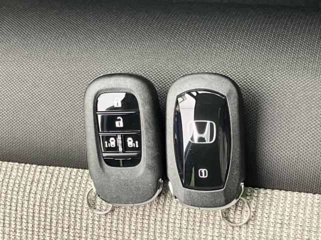 Ｎ－ＢＯＸ ヒョウジュン　保証書／純正　８インチ　ナビ／ホンダセンシング／両側電動スライドドア／シートヒーター　前席／車線逸脱防止支援システム／パーキングアシスト　バックガイド／届出済未使用車　衝突被害軽減システム　禁煙車（30枚目）