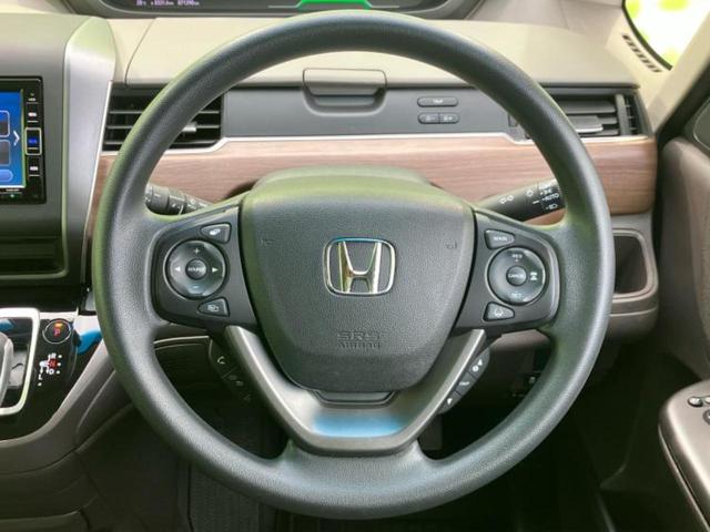 フリードハイブリッド ハイブリッドGホンダセンシング 新品タイヤ/保証書/純正 SDナビ/ホンダセンシング/両側電動スライドドア/シートヒーター 前席/車線逸脱防止支援システム/パーキングアシスト バックガイド/ドライブレコーダー 純正 バックカメラ(15枚目)