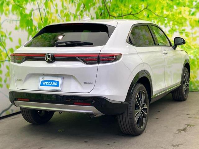 ヴェゼル ｅＨＥＶ　Ｚ　保証書／純正　９インチ　ナビ／ホンダセンシング／シートヒーター　前席／車線逸脱防止支援システム／シート　ハーフレザー／電動バックドア／登録済未使用車／ヘッドランプ　ＬＥＤ／ＵＳＢジャック　バックカメラ（3枚目）