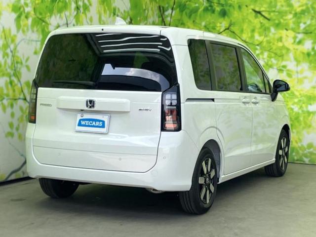 フリード ｅＨＥＶエアーＥＸ　保証書／純正　１１インチ　ナビ／ホンダセンシング／両側電動スライドドア／シートヒーター　前席／車線逸脱防止支援システム／シート　ハーフレザー／登録済未使用車／ヘッドランプ　ＬＥＤ／ＵＳＢジャック（3枚目）