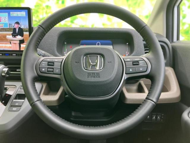 フリード ｅＨＥＶエアーＥＸ　保証書／純正　１１インチ　ナビ／ホンダセンシング／両側電動スライドドア／シートヒーター　前席／車線逸脱防止支援システム／シート　ハーフレザー／登録済未使用車／ヘッドランプ　ＬＥＤ／ＵＳＢジャック（15枚目）