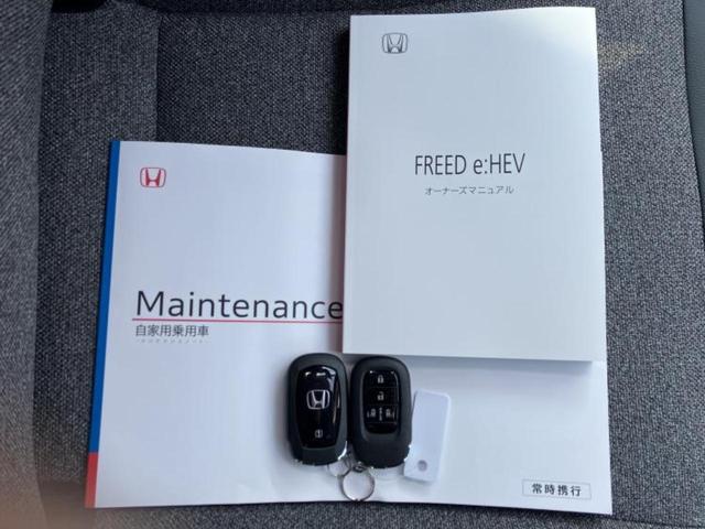 フリード ｅＨＥＶエアーＥＸ　保証書／純正　１１インチ　ナビ／ホンダセンシング／両側電動スライドドア／シートヒーター　前席／車線逸脱防止支援システム／シート　ハーフレザー／登録済未使用車／ヘッドランプ　ＬＥＤ／ＵＳＢジャック（32枚目）