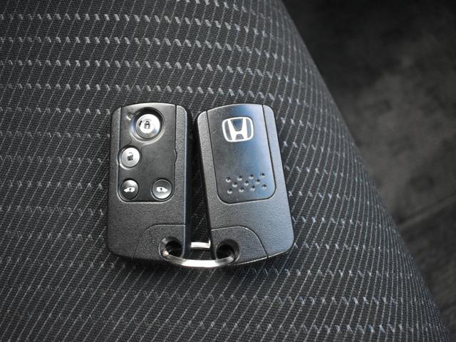 フリードハイブリッド ジャストセレクション 純正ナビ/バックモニター/Bluetooth/ワンセグTV/両側電動スライドドア/ETC/クルーズコントロール/横滑り防止装置/オートエアコン/スマートキー2個(32枚目)