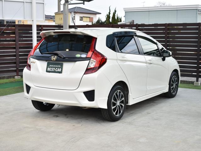 フィット 13G・Sパッケージ 衝突被害軽減ブレーキ/社外ナビ/Bluetooth/フルセグTV/バックモニター/ETC/プッシュスタート/クルーズコントロール/横滑り防止装置/オートエアコン/スマートキー2個/パドルシフト(11枚目)