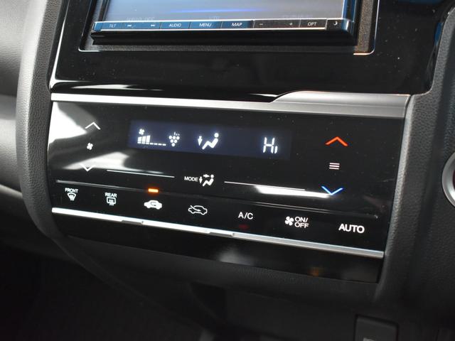 フィット 13G・Sパッケージ 衝突被害軽減ブレーキ/社外ナビ/Bluetooth/フルセグTV/バックモニター/ETC/プッシュスタート/クルーズコントロール/横滑り防止装置/オートエアコン/スマートキー2個/パドルシフト(29枚目)