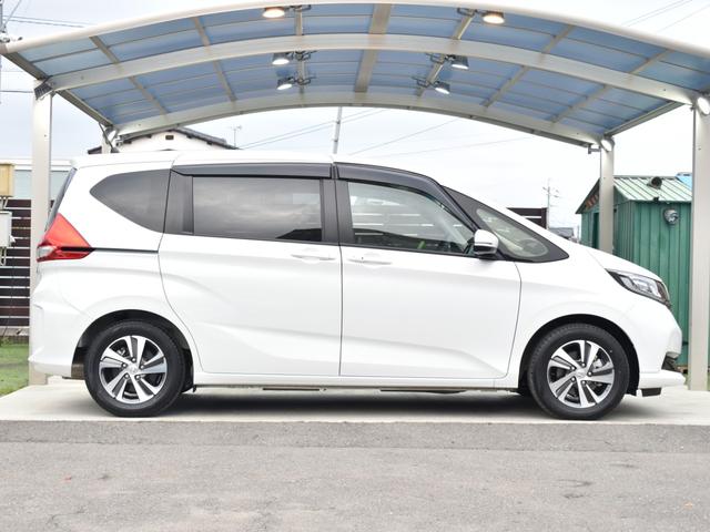 フリードハイブリッド ハイブリッド・Ｇ　ホンダセンシング／両側電動スライドドア／社外ナビ／バックモニター／フルセグＴＶ／Ｂｌｕｅｔｏｏｔｈ／前席シートヒーター／プッシュスタート／車線逸脱防止支援システム／横滑り防止装置／ＥＴＣ（8枚目）