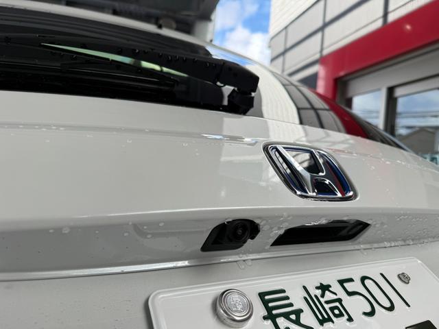 フリード ｅ：ＨＥＶエアー　ＥＸ　９インチナビ　フルセグ　バックカメラ　両側パワースライド　スマートキー　ホンダセンシング　シートヒーター　ＢＳＭ　純正アルミ　ＬＥＤ（21枚目）