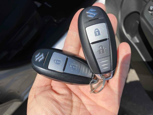 スイフト ＸＧ　スマートキー２個　電動格納ミラー　ＣＶＴ　盗難防止システム　衝突安全ボディ　記録簿　ＡＢＳ　ＥＳＣ　ＣＤ　エアコン　パワーステアリング　パワーウィンドウ（9枚目）