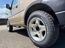ＫＡＮＳＡＩ　４ＷＤ　ターボ　ＡＴ４速　カスタムリペイント車　純正アルミホイール　ＴＯＹＯオープンカントリータイヤ　ホワイトレタータイヤ　ルーフキャリア　革調シートカバー　キーレスエントリー（12枚目）