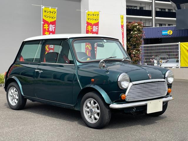 ＭＩＮＩ タータン　正規ディーラー車　限定車　走行５万Ｋｍ台　車検Ｒ７年１月　フェンダーミラー　ウッドパネル　ＥＴＣ　純正アルミホイール　純正チェック柄シート　ＣＤコンポ（7枚目）