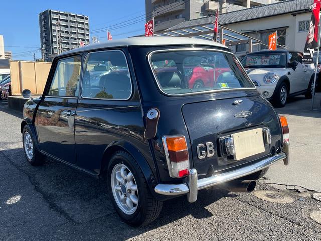 MINI 1.3 正規ディラー車 4速マニュアル 走行3.2万Km ハイロウキッド クイックシフト ウッドパネル オーバーフェンダー フェンダーミラー オーバーライダー ナルディステアリング センターマフラー(8枚目)
