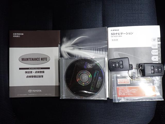 ハイブリッドG 1年保証付 フルセグTV メモリーナビ DVD再生 CD再生 バックカメラ ETC 両側電動スライドドア LEDヘッドランプ ウオークスルー 乗車定員7人 3列シート ワンオーナー 整備点検記録簿(24枚目)