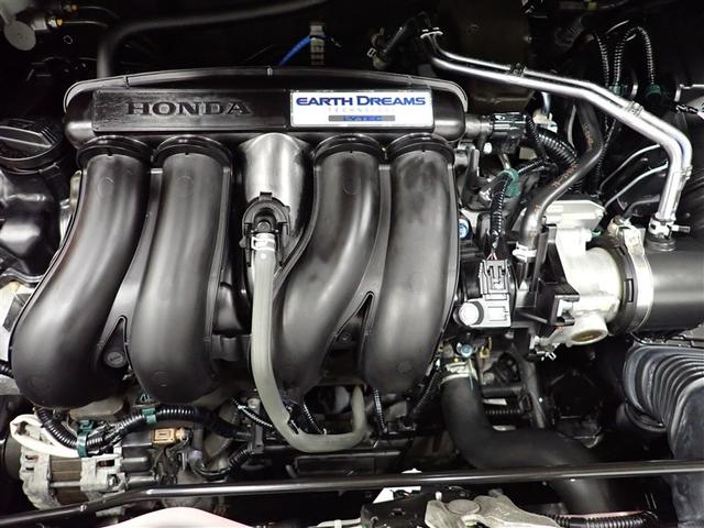 フリード クロスター・ホンダセンシング　ＤＶＤ再生　バックカメラ　衝突被害軽減システム　ＥＴＣ　両側電動スライド　ＬＥＤヘッドランプ　ウオークスルー　乗車定員６人　３列シート　アイドリングストップ（5枚目）