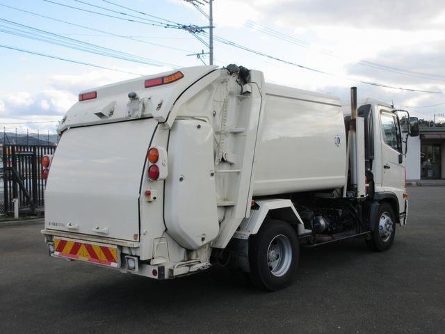 ヒノレンジャー 　上物新明和製回転板式パッカー車　容積６．４立米　汚水タンク付き　スペア吊り欠　連続切り替えスイッチ付き　緊急停止ボタン及び緊急停止スイッチ付き　オートマ　床後方鉄板２重張り（2枚目）