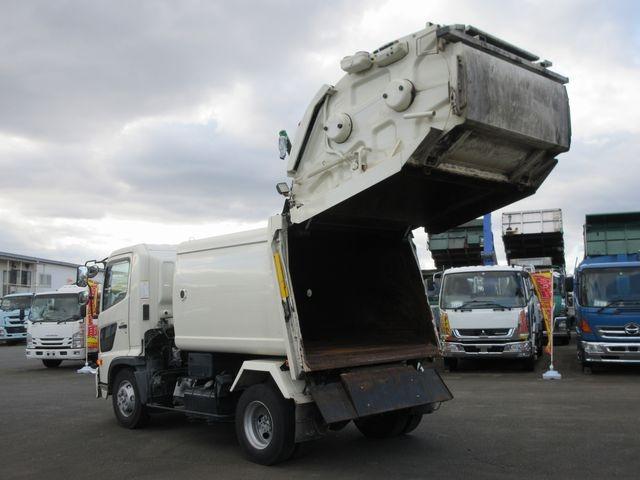 ヒノレンジャー 　上物新明和製回転板式パッカー車　容積６．４立米　汚水タンク付き　スペア吊り欠　連続切り替えスイッチ付き　緊急停止ボタン及び緊急停止スイッチ付き　オートマ　床後方鉄板２重張り（3枚目）