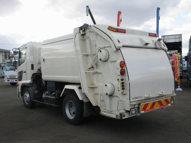 ヒノレンジャー 　上物新明和製回転板式パッカー車　容積６．４立米　汚水タンク付き　スペア吊り欠　連続切り替えスイッチ付き　緊急停止ボタン及び緊急停止スイッチ付き　オートマ　床後方鉄板２重張り（8枚目）